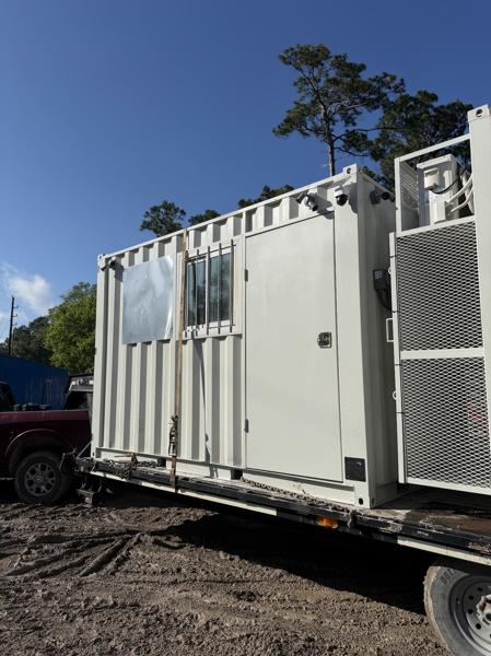 Finished interior of a workforce cooling break room container by ForgeX Industries