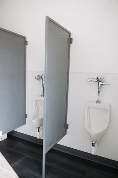 Container restroom interior with commercial fixtures by ForgeX Industries