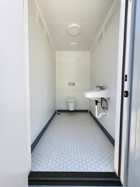 Container restroom exterior by ForgeX Industries
